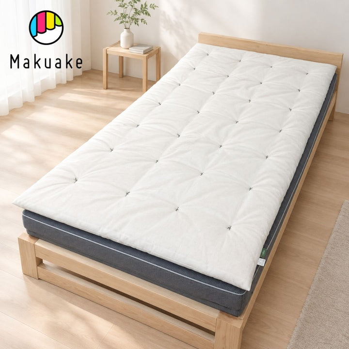 天然素材100％の極厚ベッドパッド「綿のねどこ™」のMakuakeロゴ入りのメイン画像
